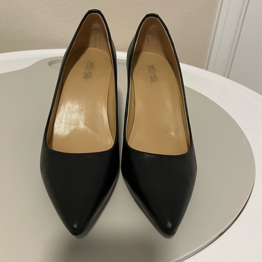 Black, leather, pointed pumps, size 7 1/2 M.
